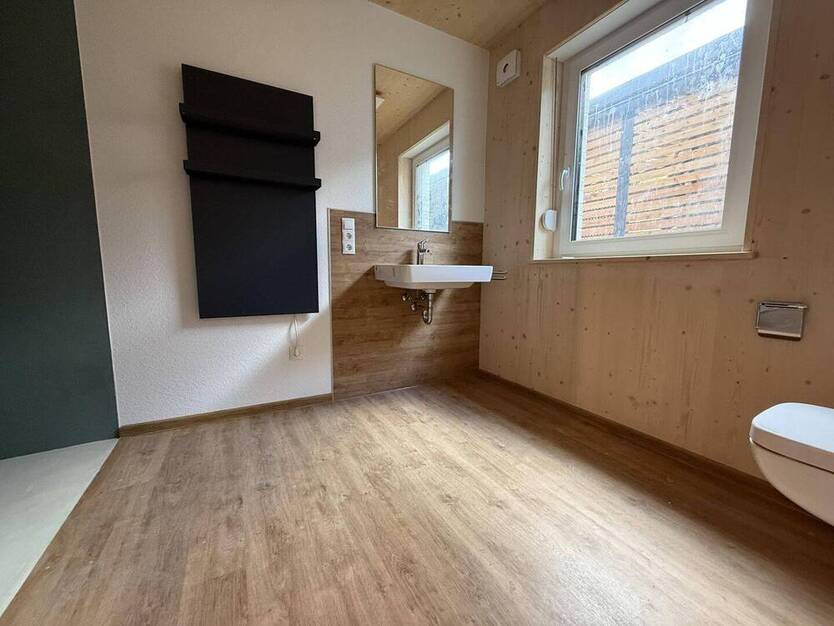 Modernes Wohnen im nachhaltigen Holz-Hybrid-Haus