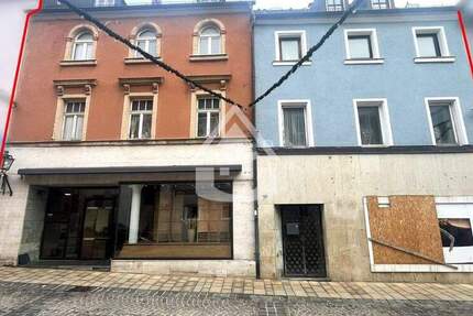 Zentrale Stadthäuser mit Gewerbeeinheiten 1 zimmer