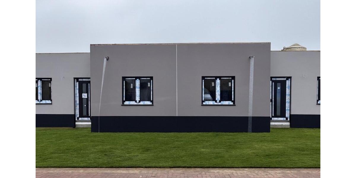 Moderne Neubau-Doppelhaushälfte in Wittenberge–Wohnen am Elbufer 3 zimmer