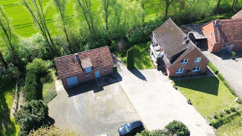 Interessantes Wohnhaus mit 2 Wohnungen, Nebengebäude und Grünland - Einfamilienhaus Stolzenau | Angebot:27142431