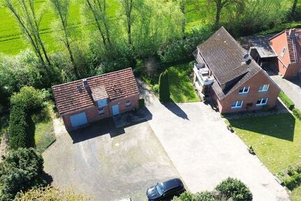 Interessantes Wohnhaus mit 2 Wohnungen, Nebengebäude und Grünland - Haus Stolzenau | Angebot:27142431