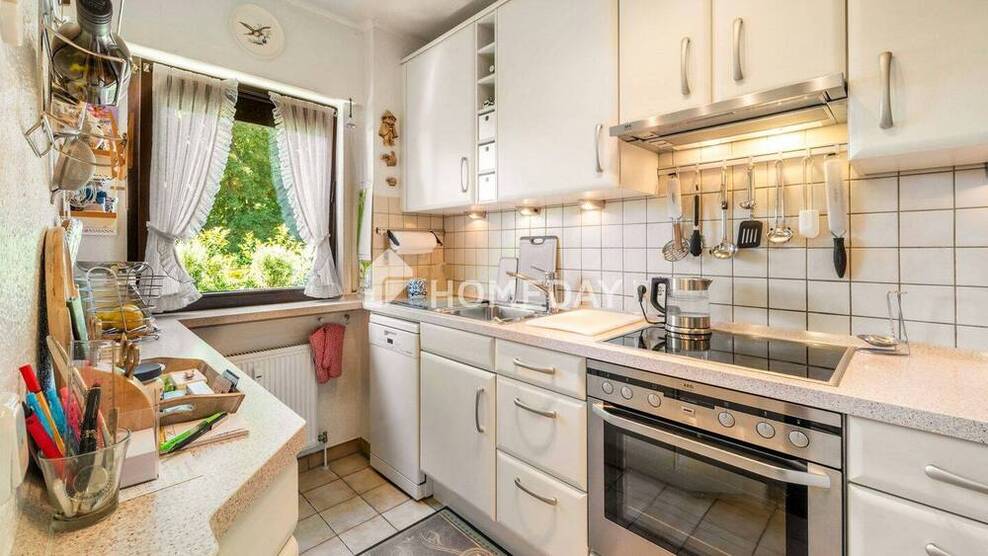 Charmante 3-Zimmer-Eigentumswohnung mit Westbalkon, Gemeinschaftsgarten und Einzelgarage