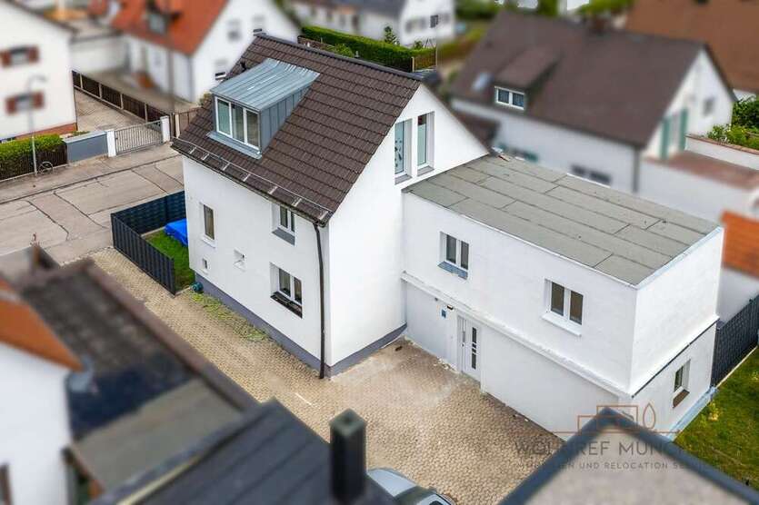 Haus zum Kaufen in München 1.390.000 € 227 m²