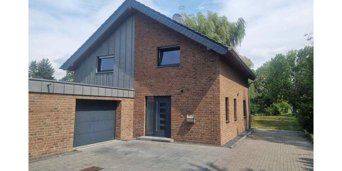 Einfamilienhaus mit großem Garten und Garage 4 zimmer