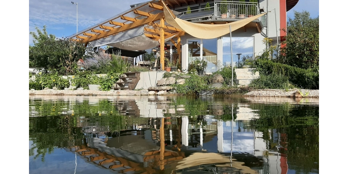 Ein Juwel der Nachhaltigkeit: Sonnenhaus bei Coburg - Zweifamilienhaus Rödental | Angebot:23787139