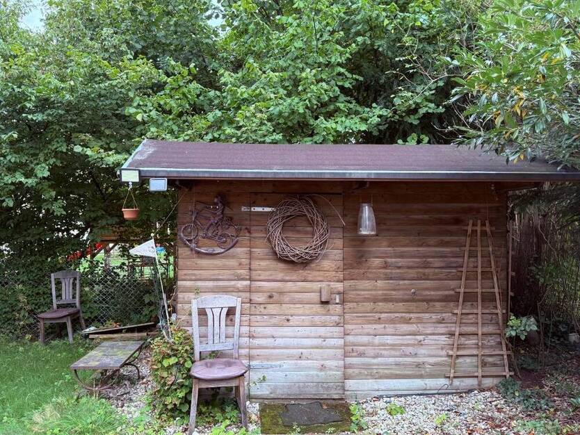 WEIGERT: Familiengerechte GartenWohnung mit Hobbyraum in Pasing unweit des Westbad