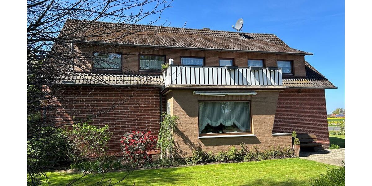Interessantes Wohnhaus mit 2 Wohnungen, Nebengebäude und Grünland - Einfamilienhaus Stolzenau | Angebot:26701576