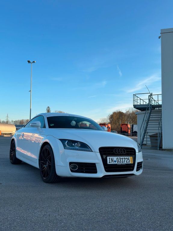 TT