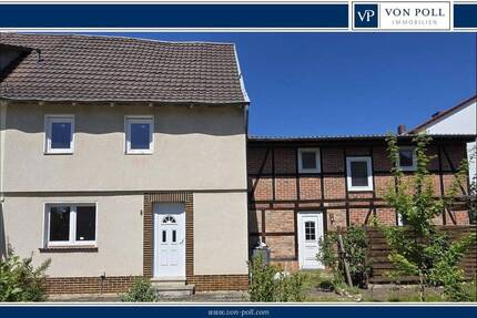 Doppelhaushälfte, die einer Sanierung bedarf, mit Anbau 6 zimmer