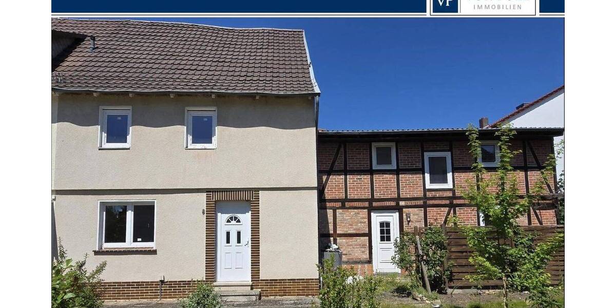 Doppelhaushälfte, die einer Sanierung bedarf, mit Anbau 6 zimmer