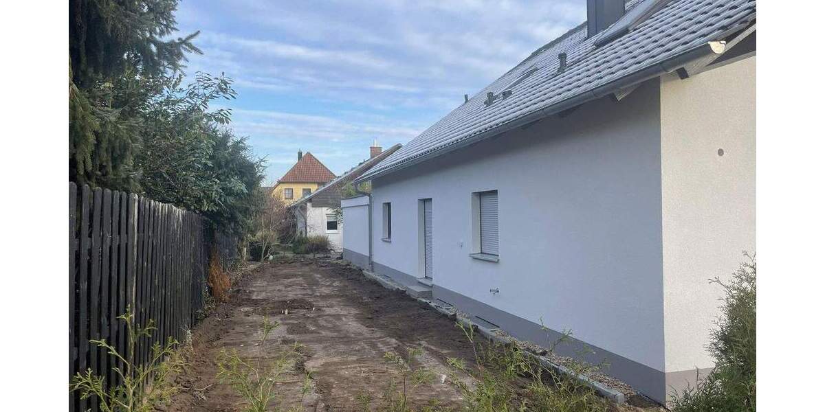 Hochwertige, energetisch sanierte 5-Zimmer-EG-Wohnung mit Balkon, Garten u. 2 Garagenstellplätzen 5 zimmer