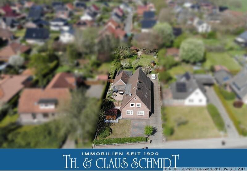Gepflegtes Doppelhaus mit Werkstatt, Doppelcarport und abtrennbarem Bauplatz in Wahnbek nahe OL