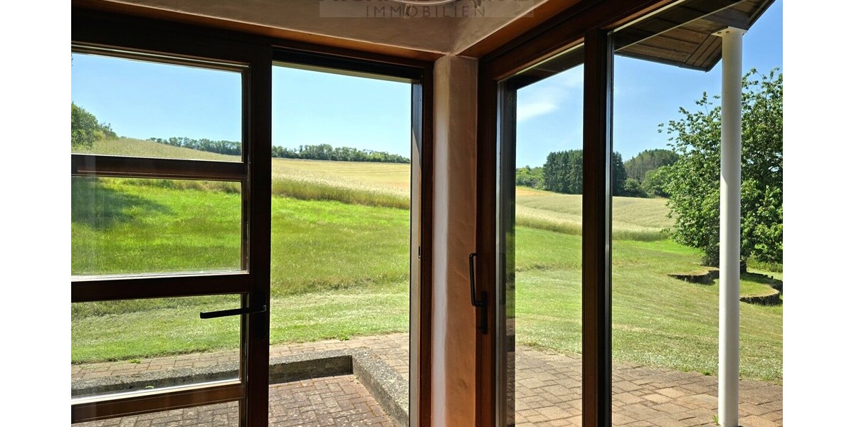 Natur pur! Außergewöhnliches Architektenhaus in traumhafter Lage und mit Einliegerwohnung - Einfamilienhaus Schmelz | Angebot:27010420