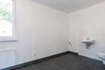 Neuwertiges Mehrfamilienhaus in Hamm-Heessen: 3 Einheiten, Gewerbefläche & privater Garten 9 zimmer