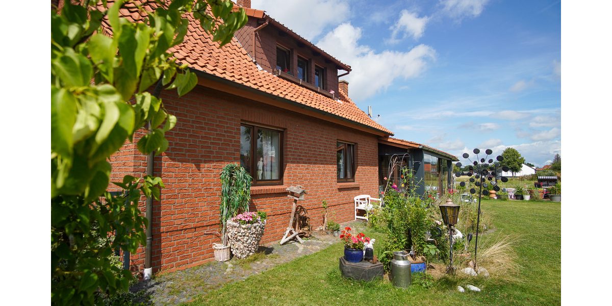 Wohngenuss mit Charme - gepflegtes Ein- bis Zweifamilienhaus mit Wintergarten - Einfamilienhaus Lemförde | Angebot:25862195