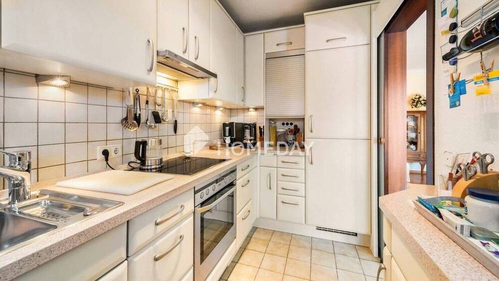 Charmante 3-Zimmer-Eigentumswohnung mit Westbalkon, Gemeinschaftsgarten und Einzelgarage