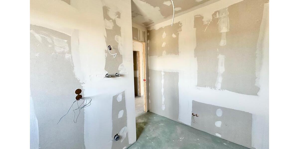 Rastede - Im Göhlen: Neubau-Reihenmittelhaus mit Einbauküche als Erstbezug 5 zimmer