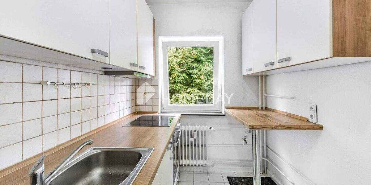 ETW mit Balkon in grüner Lage | In frisch saniertem MFH | 1. OG 3 zimmer