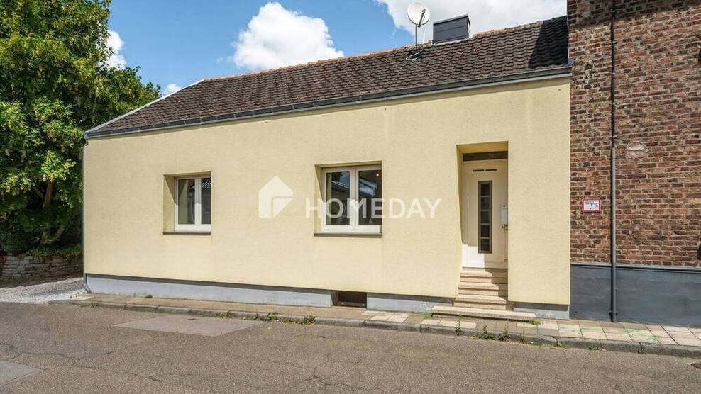 Charmantes Einfamilienhaus mit einladender Terrasse und malerischem Hof