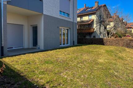 Stilvolle NeubauWohnung mit Terrasse und Garten in zentraler Lage