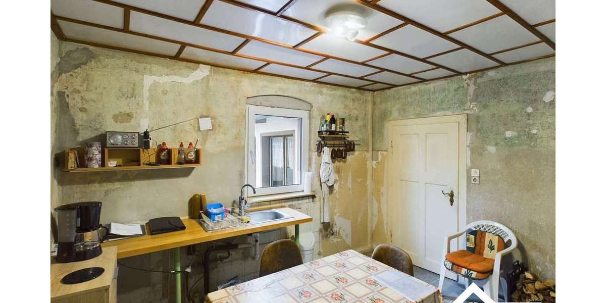 Einfamilienhaus mit viel Potenzial, großem Grundstück und vielseitig nutzbarem Nebengebäude - Einfamilienhaus Grimme Grimme | Angebot:25717453