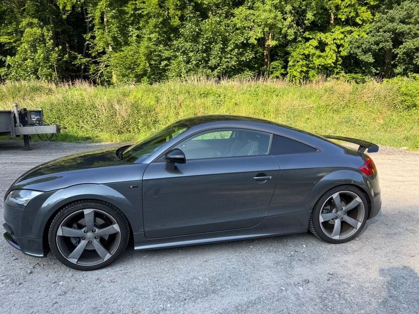 TT