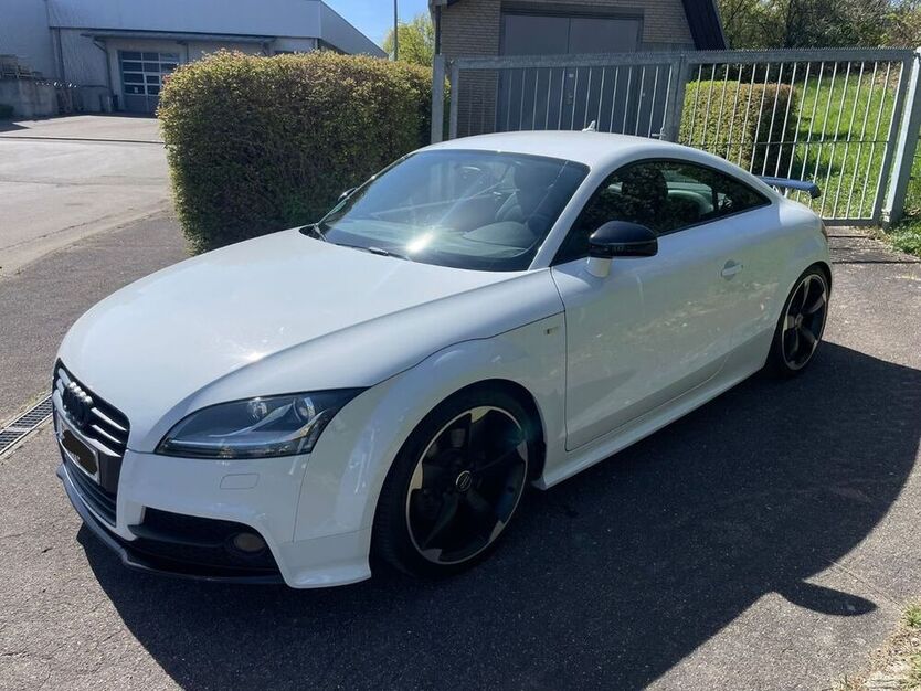 TT