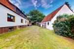 Moderne 2 Zimmer Wohnung mit Traumgarten & Garage in ruhiger Lage