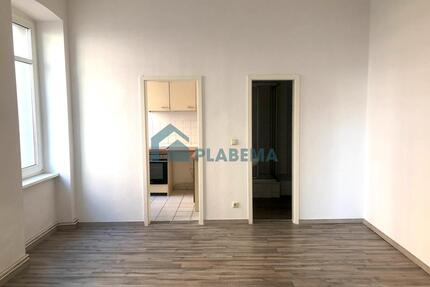 2-Zimmer-Wohnung im Hochparterre mit Einbauküche in zentraler Lage