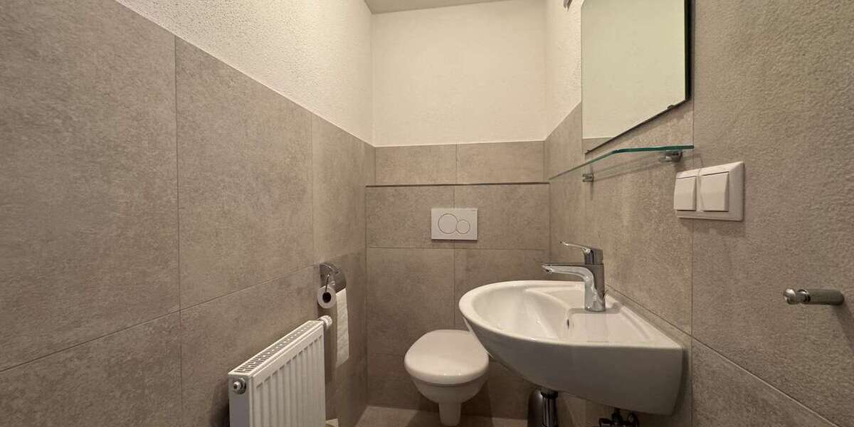 Investieren im Silberstreifen: Wohn-Gewerbeimmobilie mit Garten, Garage & Flexibilitä 6 zimmer