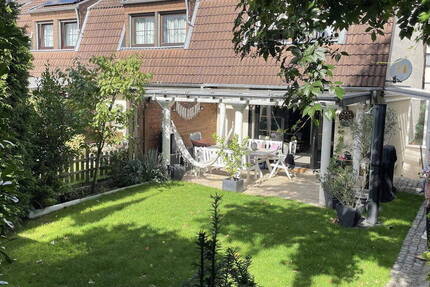 Attraktives Reihenendhaus mit EinliegerWohnung, Garten & Carport - Viel Platz für Familie & mehr