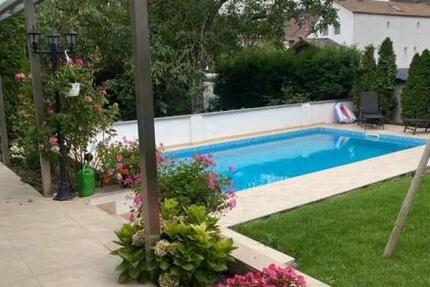 ObjNr:19320 - Topp Wohnen im sanierten EFH mit ELW, Terrasse, Garten und Schwimmbad in LU-Mundenheim