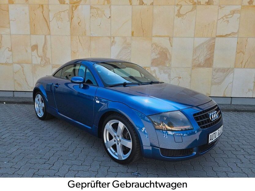 TT