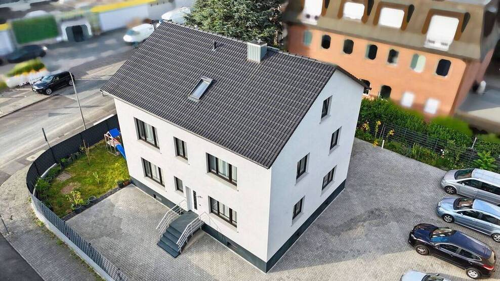 Wohn- und Geschäftshaus in Toplage von Frankfurt-Seckbach - Wohnen und Arbeiten unter einem Dach.