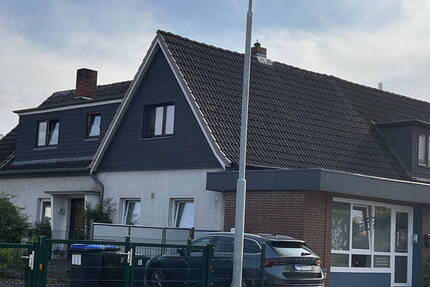 DHH mit Gewerbeeinheit und Einliegerwohnung in Travemünde 7 zimmer