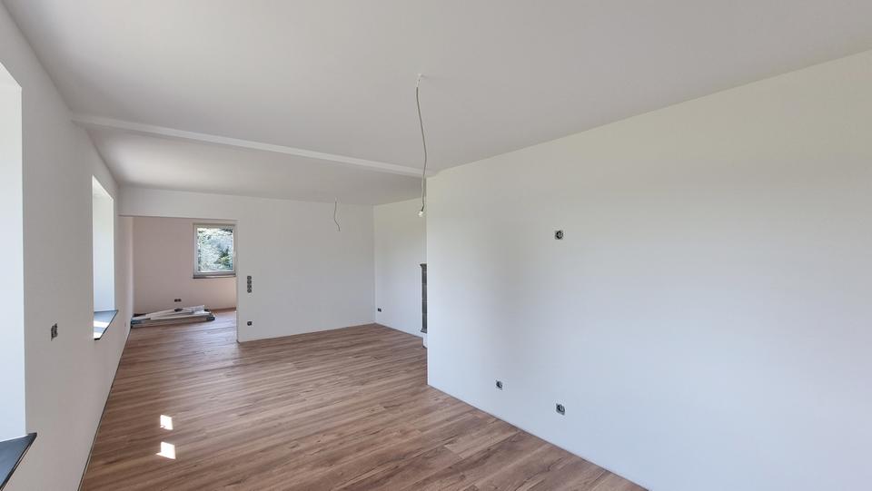 Moderne Wohnung mit dem Wohngefühl einer Doppelhaushälfte – Erstbezug nach Sanierung! zimmer
