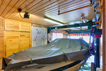 Reetgedecktes, winterfestes Bootshaus mit Bootsgarage und Motorboot am Ziegelsee sofort nutzbar - Ferienhaus Schwerin Werdervorstadt | Angebot:26421371