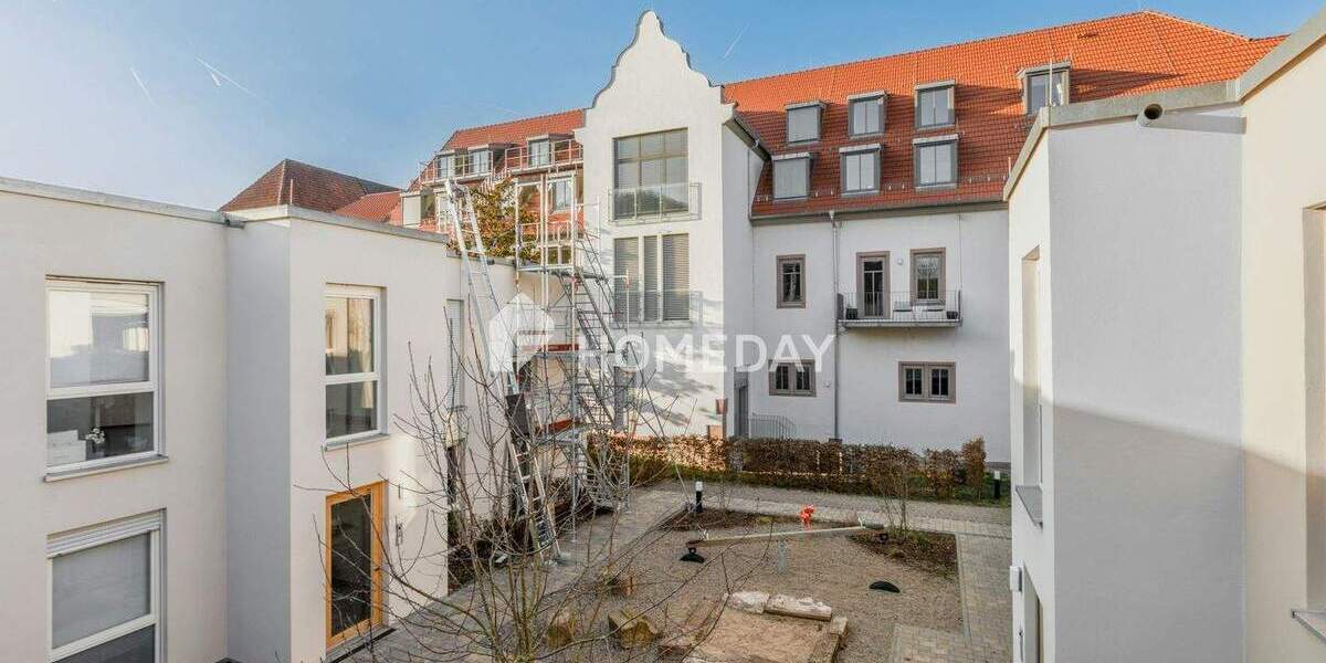 Wohnen mit Geschichte: Exklusive Eigentumswohnung im denkmalgeschützten Bestandsbau in Zell am Main 3 zimmer