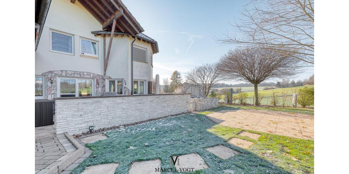 Großes Familienhaus mit Premium-Ausstattung und Vermietungsoption 8.5 zimmer