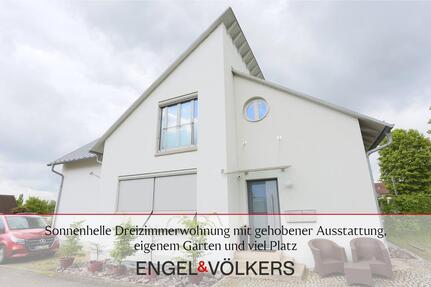 Sonnenhelle DreiZimmerwohnung mit gehobener Ausstattung, eigenem Garten und viel Platz