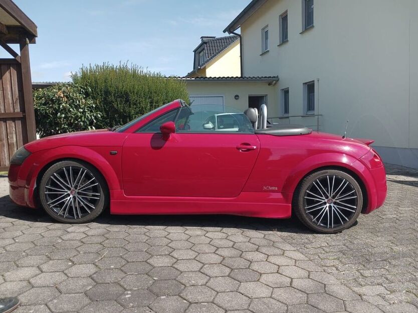 TT