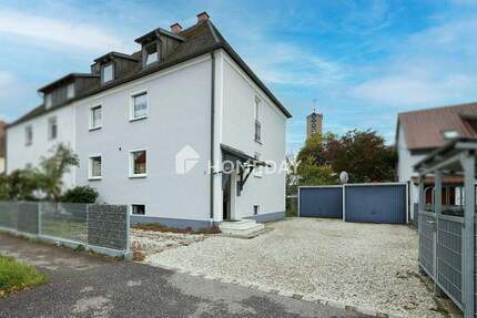 Gepflegte DHH mit vier Wohneinheiten, großem Garten und stabilem Mietertrag in zentraler Lage 7 zimmer