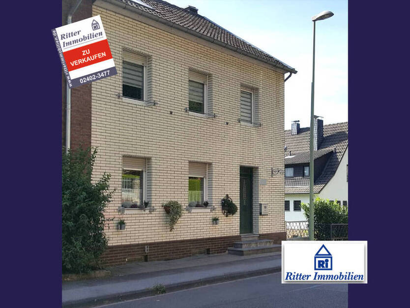 Ritter Immobilien e.K.: Gemütliches 1-2Familienhaus mit schönem Garten und großer Garage