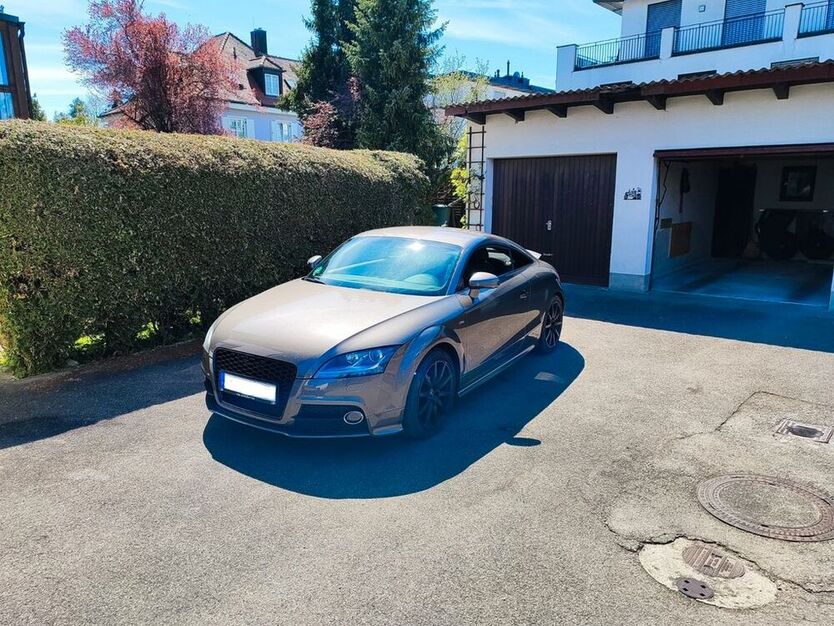 TT