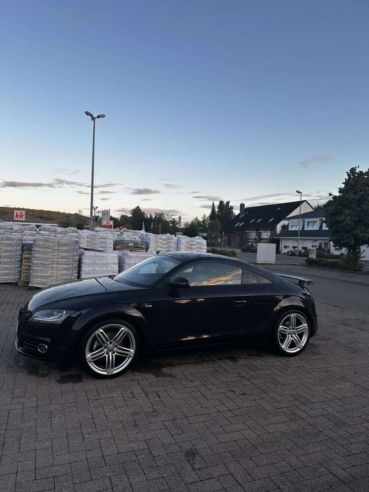 TT