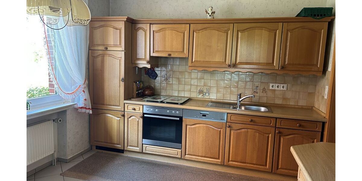 Interessantes Wohnhaus mit 2 Wohnungen, Nebengebäude und Grünland - Einfamilienhaus Stolzenau | Angebot:27142431