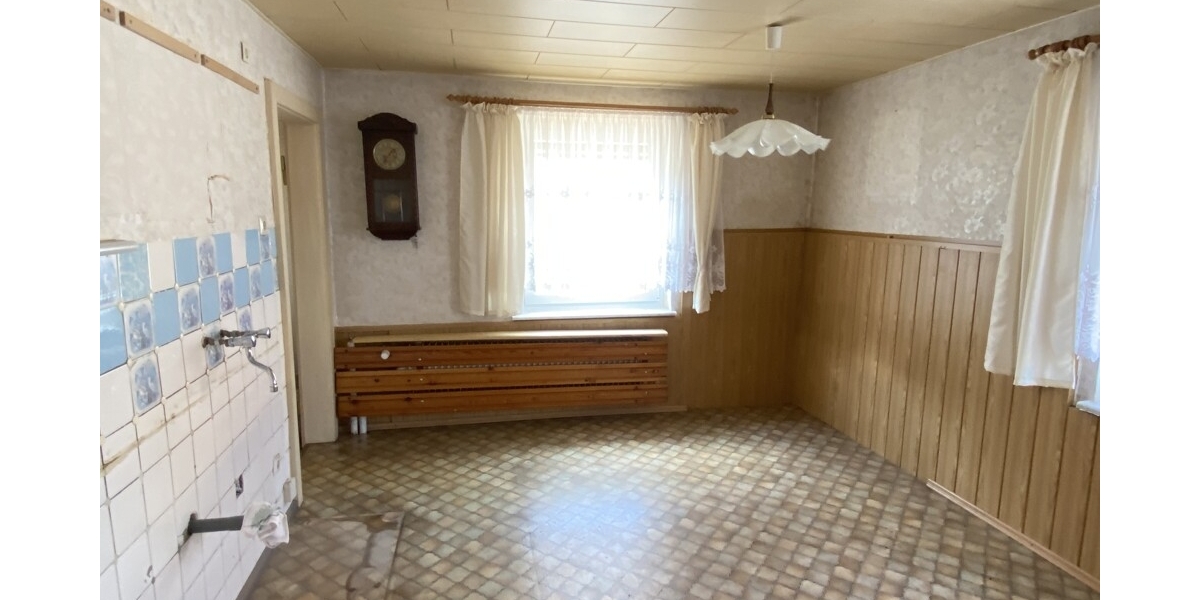Gemütliche Doppelhaushälfte mit großem Grundstück und Doppelgarage in ruhiger Siedlungslage - Doppelhaushälfte Röderaue | Angebot:27134387