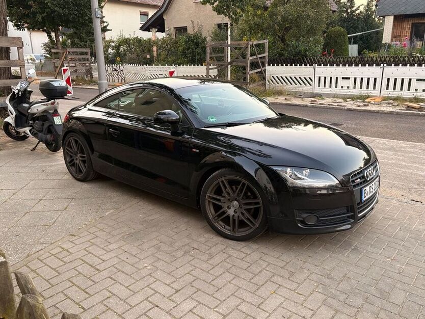 TT