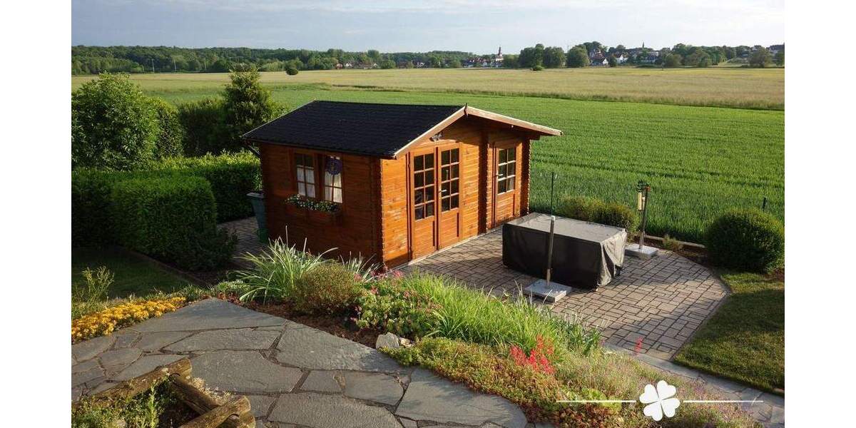 BERK Immobilien - Gepflegtes Einfamilienhaus mit schönem Garten in unverbaubarer Feldrandlage 6 zimmer