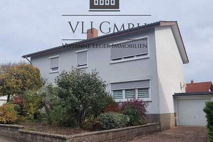 Zweifamilienhaus in St. Ingbert-Hassel - gepflegtes Wohnhaus mit großem Garten und flexibler Nutzung 6 zimmer